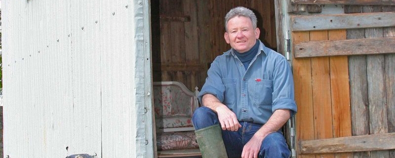 David Morris at the door of a shepherd's hut