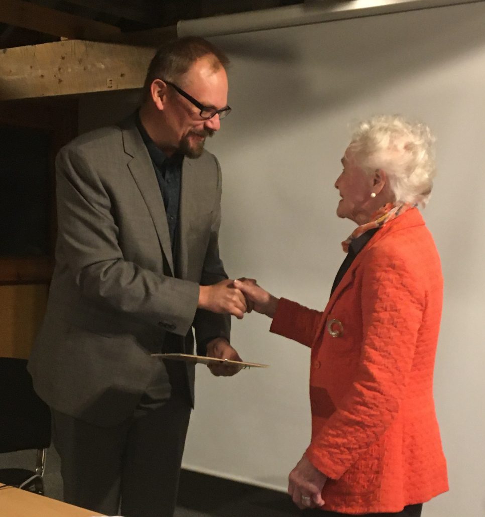 Jill Sumner receives her Volunteer of the Year Award from DMA Chair Jon Murden 