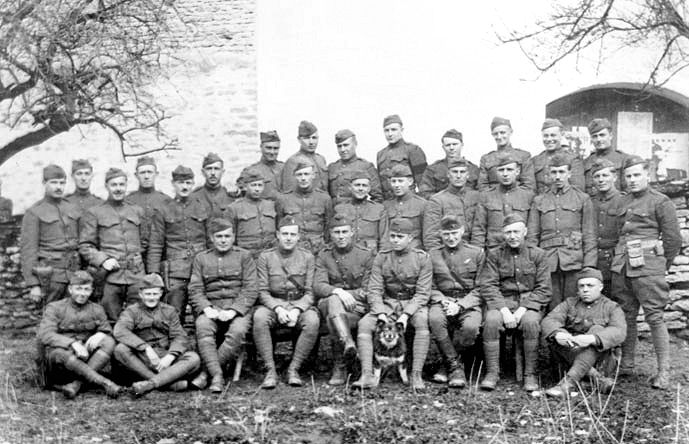 135th Aero Squadron Group with rescued puppy